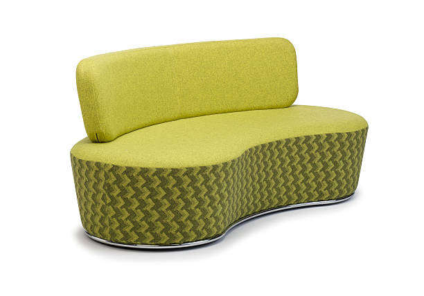 Modern green sofa isolated on white background