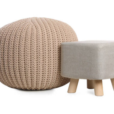 Stylish pouf and ottoman on white background. home design