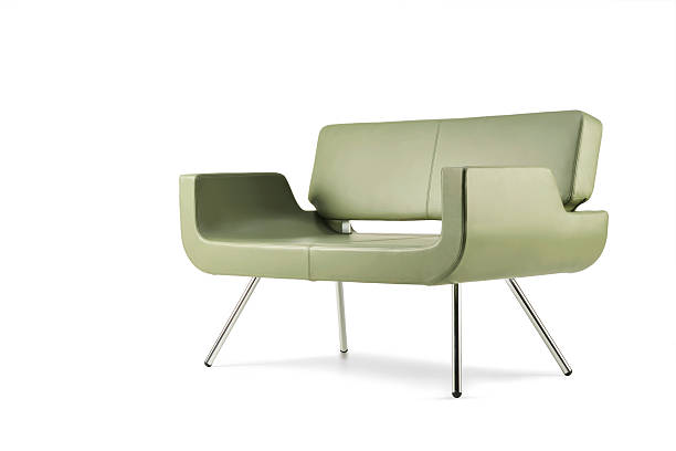 Side view of green leather sofa isolated on white background